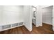 Mudroom with storage and entry to bathroom and walk-in closet at 517 Hyde Ridge Trl, Loganville, GA 30052