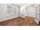 Sunlit office with beautiful flooring, bright windows, and glass French doors at 517 Hyde Ridge Trl, Loganville, GA 30052