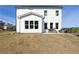 Home exterior with patio, showing outdoor living space and well-maintained lawn at 602 Belshire Dr, Acworth, GA 30102