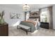Comfortable bedroom featuring a seating bench, stylish decor, and a sun-drenched window at 602 Belshire Dr, Acworth, GA 30102