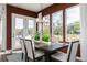 Bright dining area with lots of natural light and a view to an outdoor seating area at 602 Belshire Dr, Acworth, GA 30102