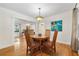Dining room with hardwood floors, classic decor, and ample natural light at 2655 Appian Way, Decatur, GA 30030