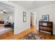 Hallway with hardwood floors leading to the living room and other areas of the home at 2655 Appian Way, Decatur, GA 30030