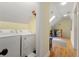 Laundry area with a washer and dryer located near the hallway at 2655 Appian Way, Decatur, GA 30030