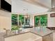 Bright kitchen with a farmhouse sink, stainless faucet, and plenty of counter space overlooking lush backyard at 2715 Woods Ridge Dr, Alpharetta, GA 30022