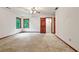 Bright bedroom with two windows and light-colored walls at 3267 Rememberance Trce, Lawrenceville, GA 30044