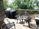 Outdoor deck area featuring metal furniture, creating an inviting space for outdoor gatherings and relaxation at 4040 Summit Dr, Marietta, GA 30068