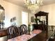 Dining room with wood floors, a crystal chandelier and large buffet at 4040 Summit Dr, Marietta, GA 30068
