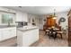 Bright kitchen featuring white cabinets, granite countertops, and stainless steel appliances at 4040 Summit Dr, Marietta, GA 30068