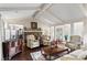 Bright and airy living room featuring a stone fireplace and classic decor at 4040 Summit Dr, Marietta, GA 30068