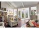 Cozy living room with a stone fireplace, plush seating, and elegant lighting at 4040 Summit Dr, Marietta, GA 30068