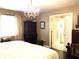 Bedroom features a dresser and access to an ensuite bathroom at 4040 Summit Dr, Marietta, GA 30068