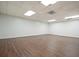 Spacious basement with a smooth floor and neutral walls ready for customization to fit any need at 10310 Amberside Ct, Roswell, GA 30076