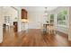Bright dining area featuring hardwood floors, neutral walls and lighting creating the perfect place to enjoy a meal at 10310 Amberside Ct, Roswell, GA 30076