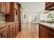 Open kitchen with granite counters, stainless steel appliances, and ample cabinet space at 10310 Amberside Ct, Roswell, GA 30076