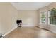Inviting living room with neutral paint, bright windows, and modern flooring throughout at 1411 Primrose Park Rd, Sugar Hill, GA 30518