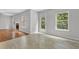 Kitchen with access to backyard, living and dining area at 6032 Trotters Cir, Fairburn, GA 30213