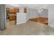 Open-concept living room and dining area with hardwood floors and stainless steel appliances at 6032 Trotters Cir, Fairburn, GA 30213