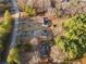Aerial view showing the roof of the home and outbuildings at 1070 Kirkland Rd, Covington, GA 30016