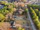 A charming lot featuring mature trees and a spacious layout, complemented by convenient road access at 1070 Kirkland Rd, Covington, GA 30016