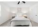 Bright bedroom with neutral tones, carpet, ceiling fan, and lots of natural light at 1070 Kirkland Rd, Covington, GA 30016