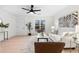 Contemporary living room with modern decor, light wood floors, and comfortable seating at 1070 Kirkland Rd, Covington, GA 30016