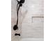 Close-up of a shower with tile surround and a rainfall shower head at 1070 Kirkland Rd, Covington, GA 30016