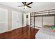 Bedroom with hardwood floors, bunk beds, and lots of natural light at 1101 Collier Rd # K2, Atlanta, GA 30318