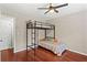Bedroom with hardwood floors, ceiling fan, and a bunk bed at 1101 Collier Rd # K2, Atlanta, GA 30318