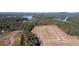Aerial view of lots available in a new community close to the lake and surrounded by trees at 146 Kingsley Way, Acworth, GA 30102