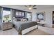 Comfortable bedroom with a bed with lots of pillows, a bench and a large window at 146 Kingsley Way, Acworth, GA 30102