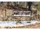 A sign for Red Top Mountain State Park with stone base, in wooded area at 146 Kingsley Way, Acworth, GA 30102