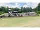 Gathering-friendly playground features multiple slides, climbing structures, and shaded seating at 146 Kingsley Way, Acworth, GA 30102