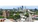 Stunning aerial view of Atlanta, showcasing the vibrant cityscape and lush greenery at 3107 Peachtree Ne Rd # 2003 Aka Ph3, Atlanta, GA 30305