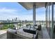 Enjoy panoramic city views from this spacious balcony with comfortable seating at 3107 Peachtree Ne Rd # 2003 Aka Ph3, Atlanta, GA 30305