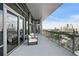 Enjoy breathtaking city views from this spacious balcony with comfortable seating at 3107 Peachtree Ne Rd # 2003 Aka Ph3, Atlanta, GA 30305