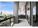 Spacious balcony overlooking the city, with a glass railing and modern design at 3107 Peachtree Ne Rd # 2003 Aka Ph3, Atlanta, GA 30305
