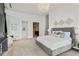 Airy bedroom features a luxurious bed, stylish decor, and ample natural light at 3107 Peachtree Ne Rd # 2003 Aka Ph3, Atlanta, GA 30305