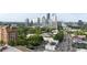 Stunning cityscape features contemporary architecture amid a canopy of trees, showcasing an exciting urban environment at 3107 Peachtree Ne Rd # 2003 Aka Ph3, Atlanta, GA 30305