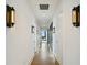Well-lit hallway with hardwood floors, stylish light fixtures, and a modern design at 3107 Peachtree Ne Rd # 2003 Aka Ph3, Atlanta, GA 30305