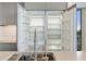 Gourmet kitchen boasts stainless steel appliances, open refrigerator, and sleek design at 3107 Peachtree Ne Rd # 2003 Aka Ph3, Atlanta, GA 30305
