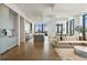 Bright and airy living room with an open floorplan and hardwood floors at 3107 Peachtree Ne Rd # 2003 Aka Ph3, Atlanta, GA 30305