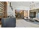 Elegant lobby area featuring marble walls, modern lighting, and comfortable seating for residents and guests at 3107 Peachtree Ne Rd # 2003 Aka Ph3, Atlanta, GA 30305