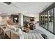 Bright lounge featuring modern furniture, art, and floor-to-ceiling glass doors and beautiful accent pieces at 3107 Peachtree Ne Rd # 2003 Aka Ph3, Atlanta, GA 30305