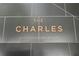 Close-up of 'The Charles' signage, located in Buckhead Village, Atlanta, for upscale condos at 3107 Peachtree Ne Rd # 2003 Aka Ph3, Atlanta, GA 30305