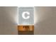 Elevator sign with a modern lighted 'C' and 'PH3' for penthouse floor in luxury building at 3107 Peachtree Ne Rd # 2003 Aka Ph3, Atlanta, GA 30305
