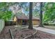 Backyard with a small patio, partially fenced, perfect for outdoor entertaining and leisure at 8350 Gledstone Way, Fairburn, GA 30213