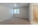 Bright bedroom with carpet and en suite bathroom at 8350 Gledstone Way, Fairburn, GA 30213