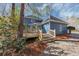 Spacious backyard deck of blue home provides space for outdoor enjoyment at 3017 Lana Ln, Marietta, GA 30066