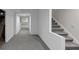 Finished basement hallway features carpeted stairs and access to other rooms at 3017 Lana Ln, Marietta, GA 30066